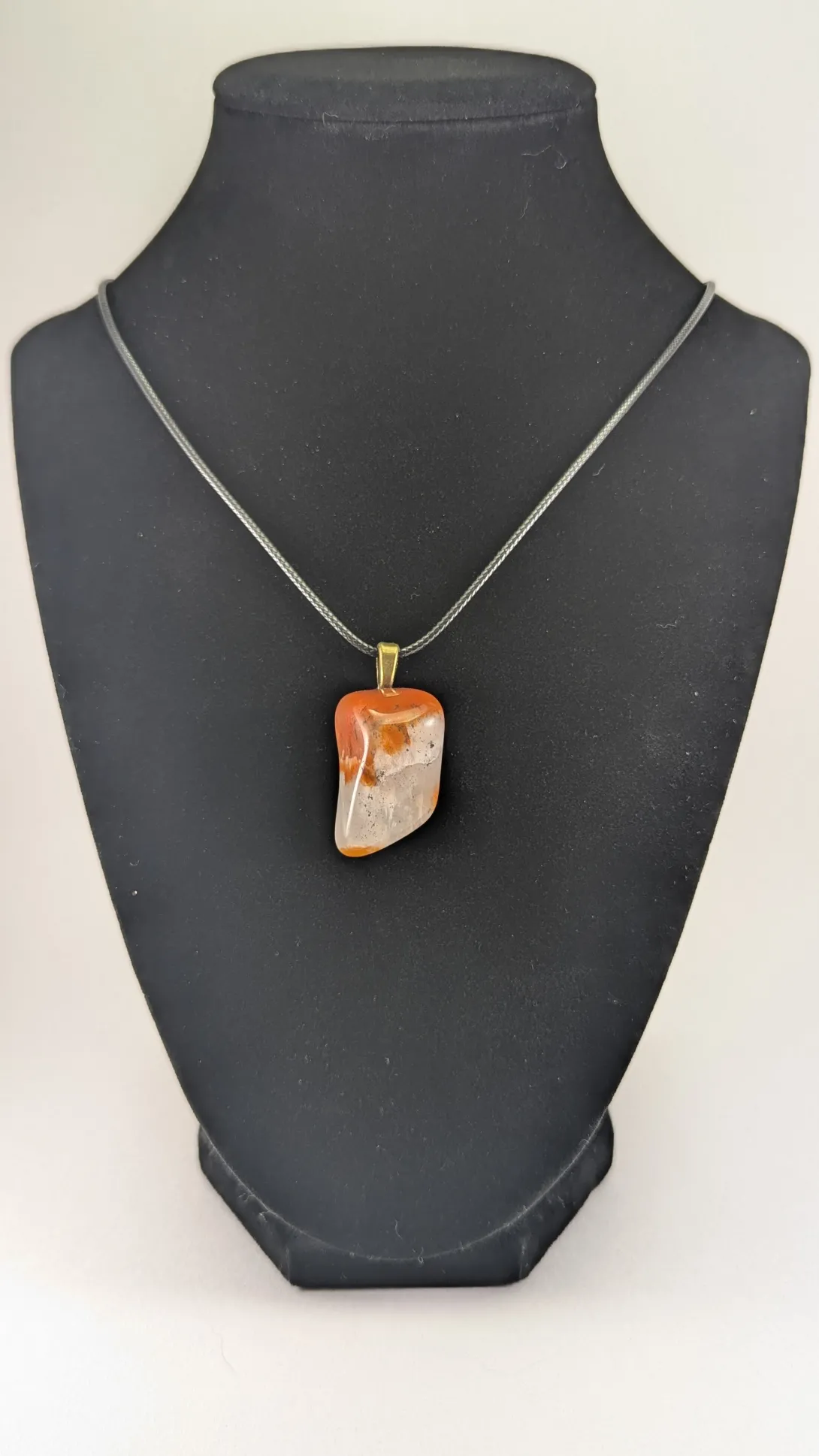 Carnelian and quartz pendant